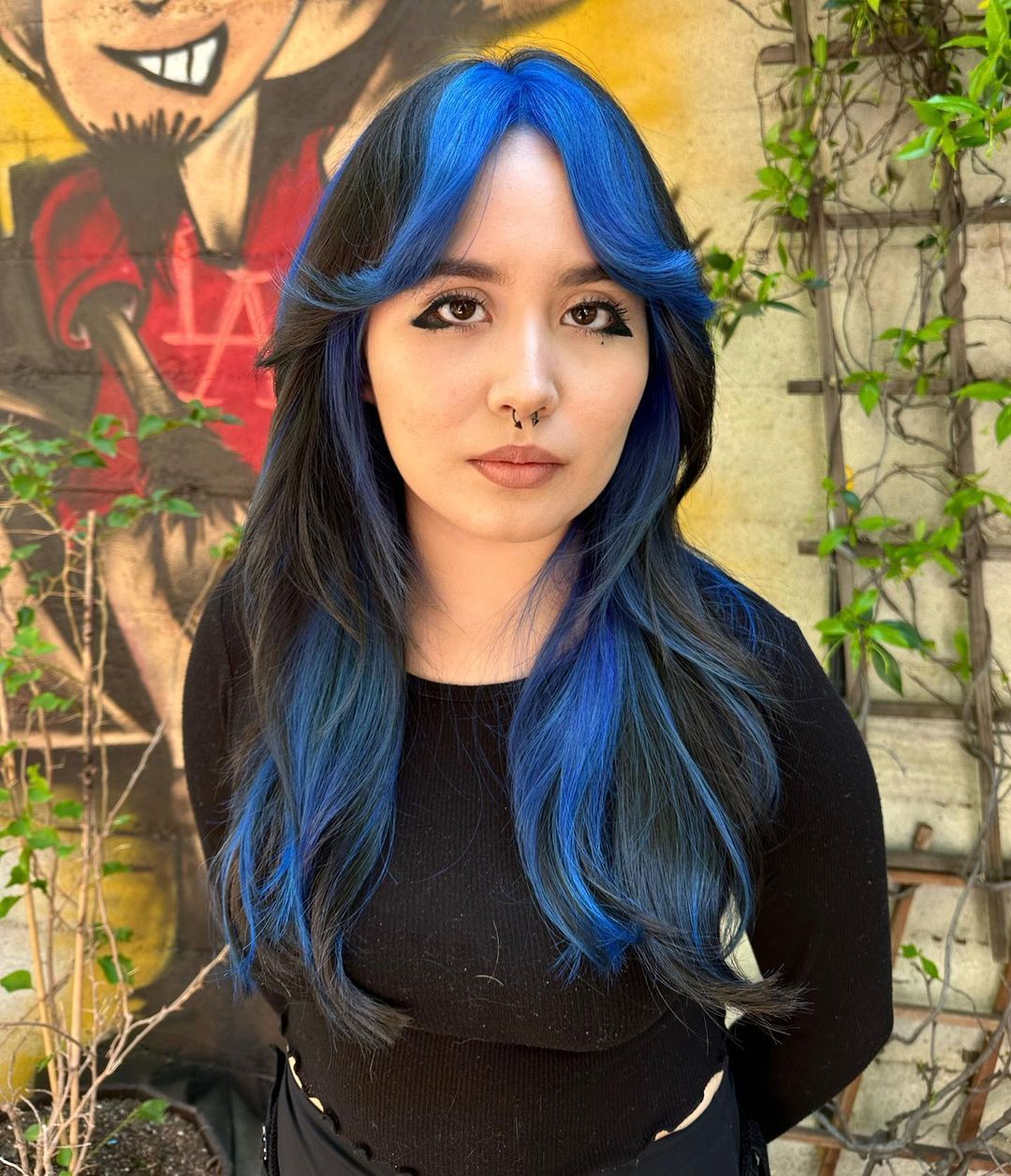 Butterfly cut with blue highlights