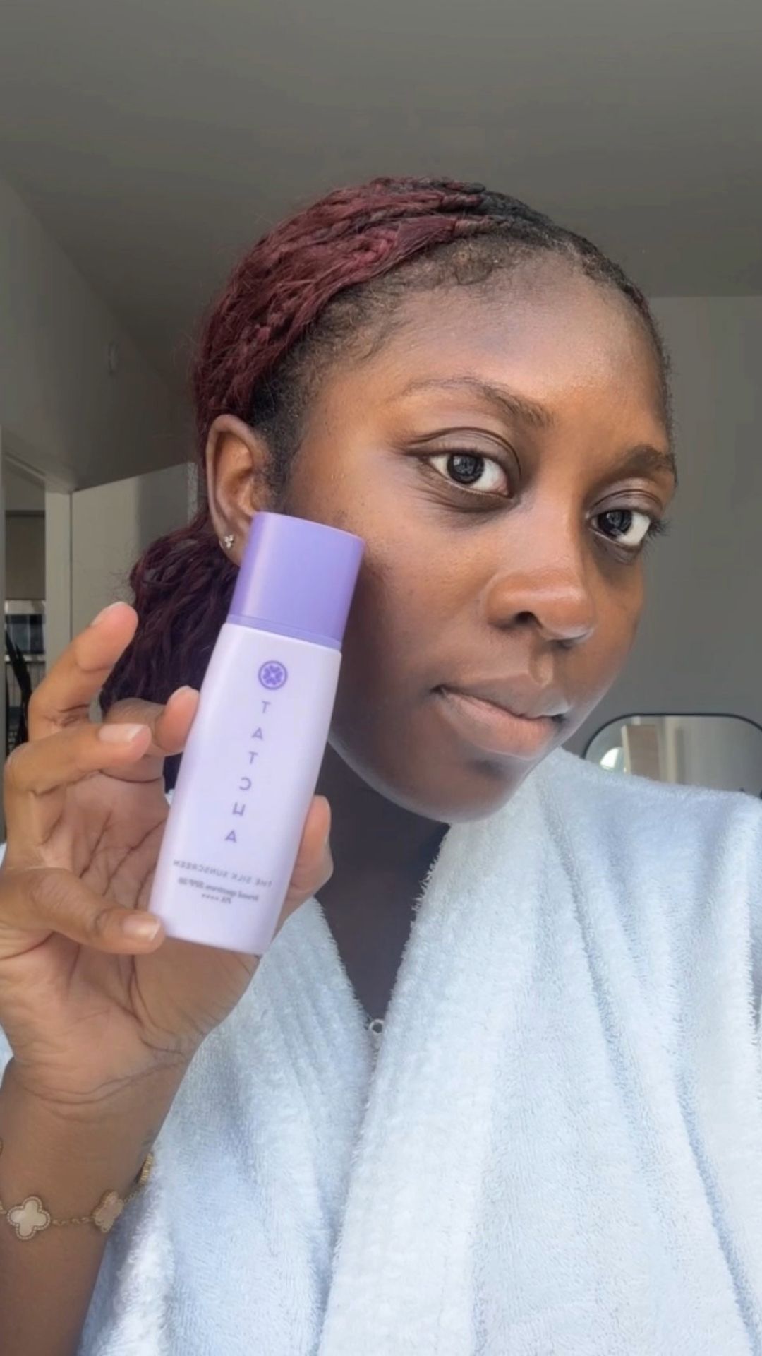 A selfie of Allure associate beauty editor Annie Blay before applying Tatcha The Silk Sunscreen SPF 50