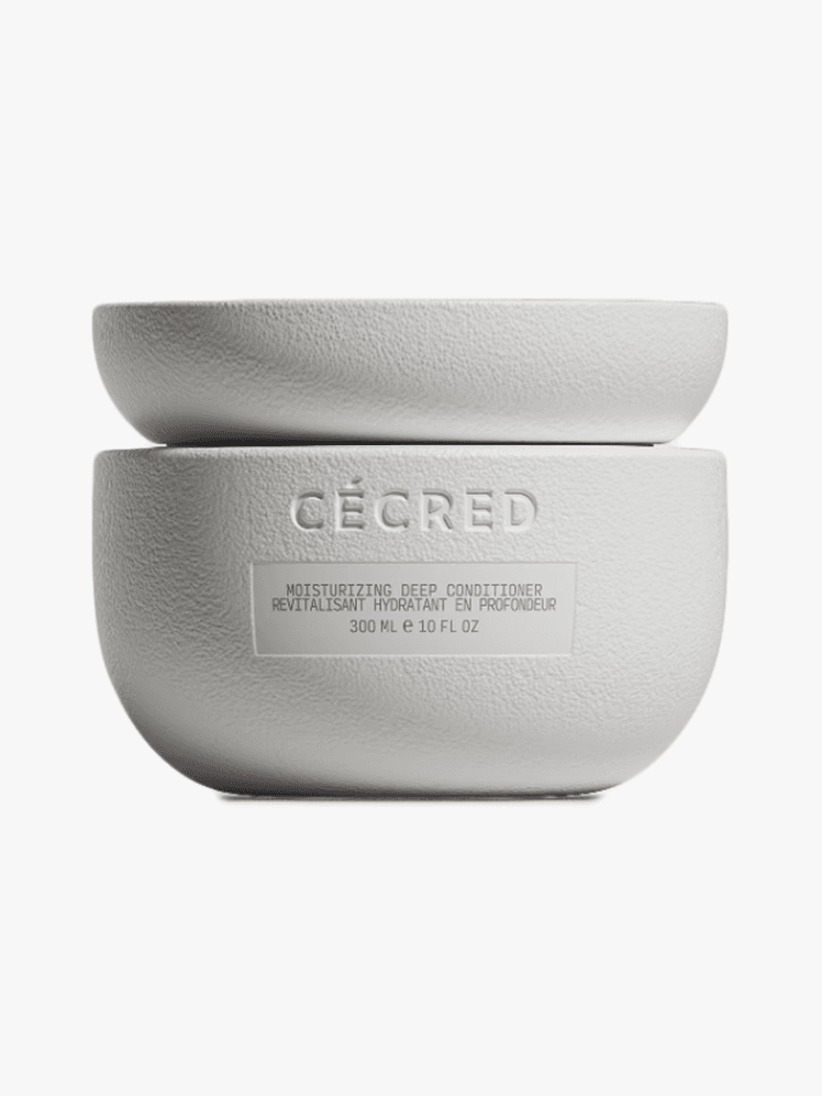 Ccred Moisturizing Deep Conditioner in branded component on a light gray background