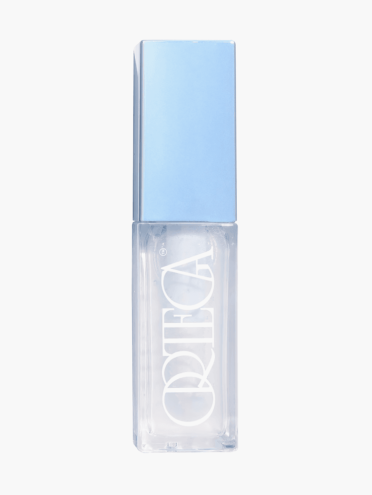 Etienne Ortega Liquid Icon Hyper Gloss in branded clear tube with blue cap on light gray background