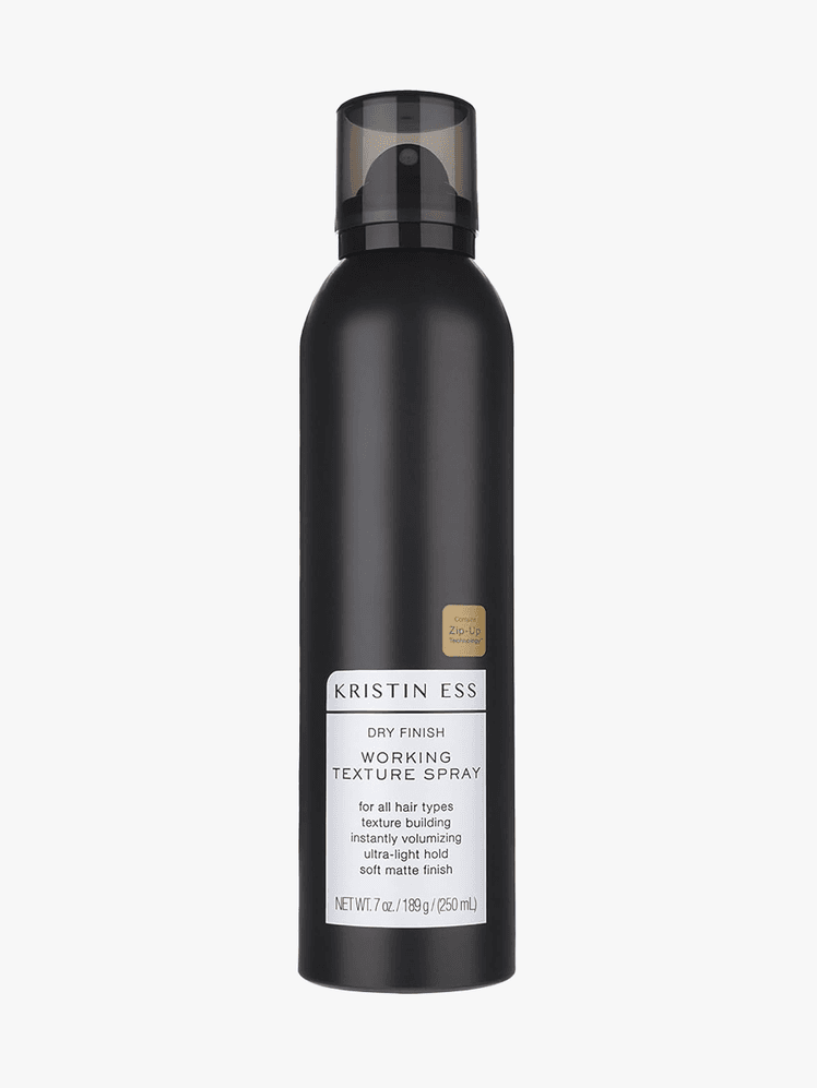 Kristin Ess Dry Finish Working Texture Hair Spray in branded component on a light gray background